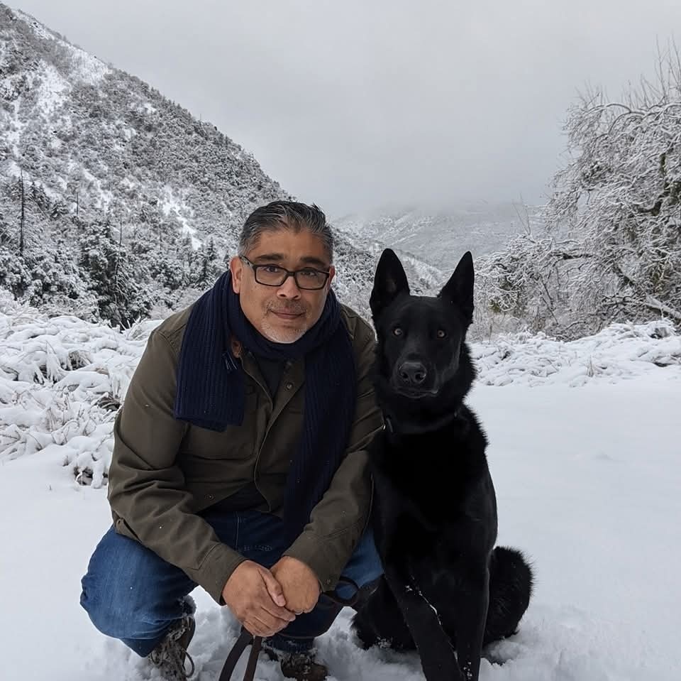 Carlos Samaniego with German Shepherd